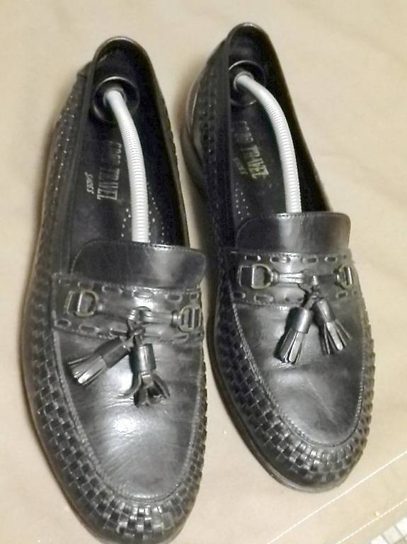 Chaussures en cuir noir pour homme à l"état de neuf