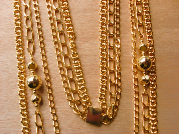 Collier sautoir en maillons dorés multi chaînes neuf