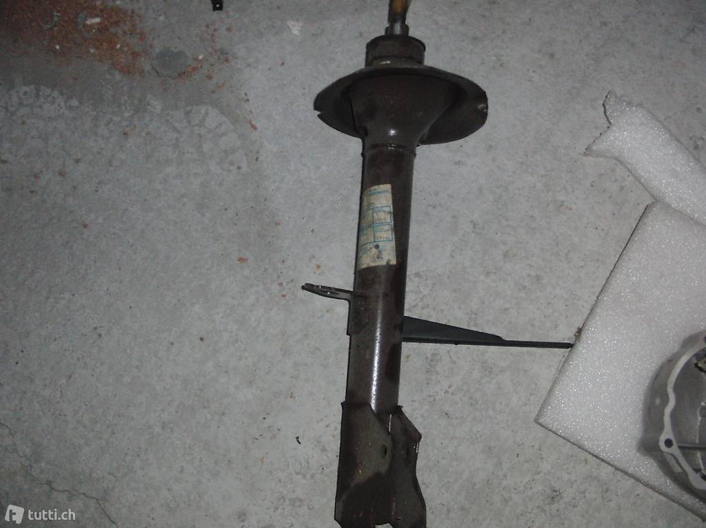 Lancia Delta 1600 HF R86 Ammortisseur arr.dr. 82436402