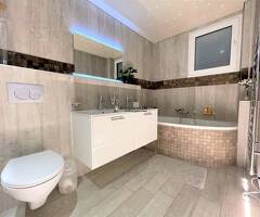 Spacieux 4.5 pièces avec sous-sol, jardin et vue sur le lac - Image 8